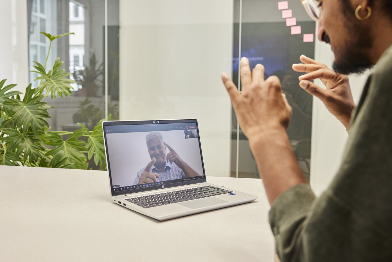Video call between two people signing.