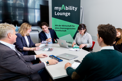 myAbility employee in a meeting